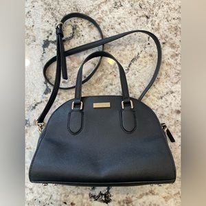 Kate Spade. Black leather cross body purse. 9.5” L x 4” W x 7.5” H